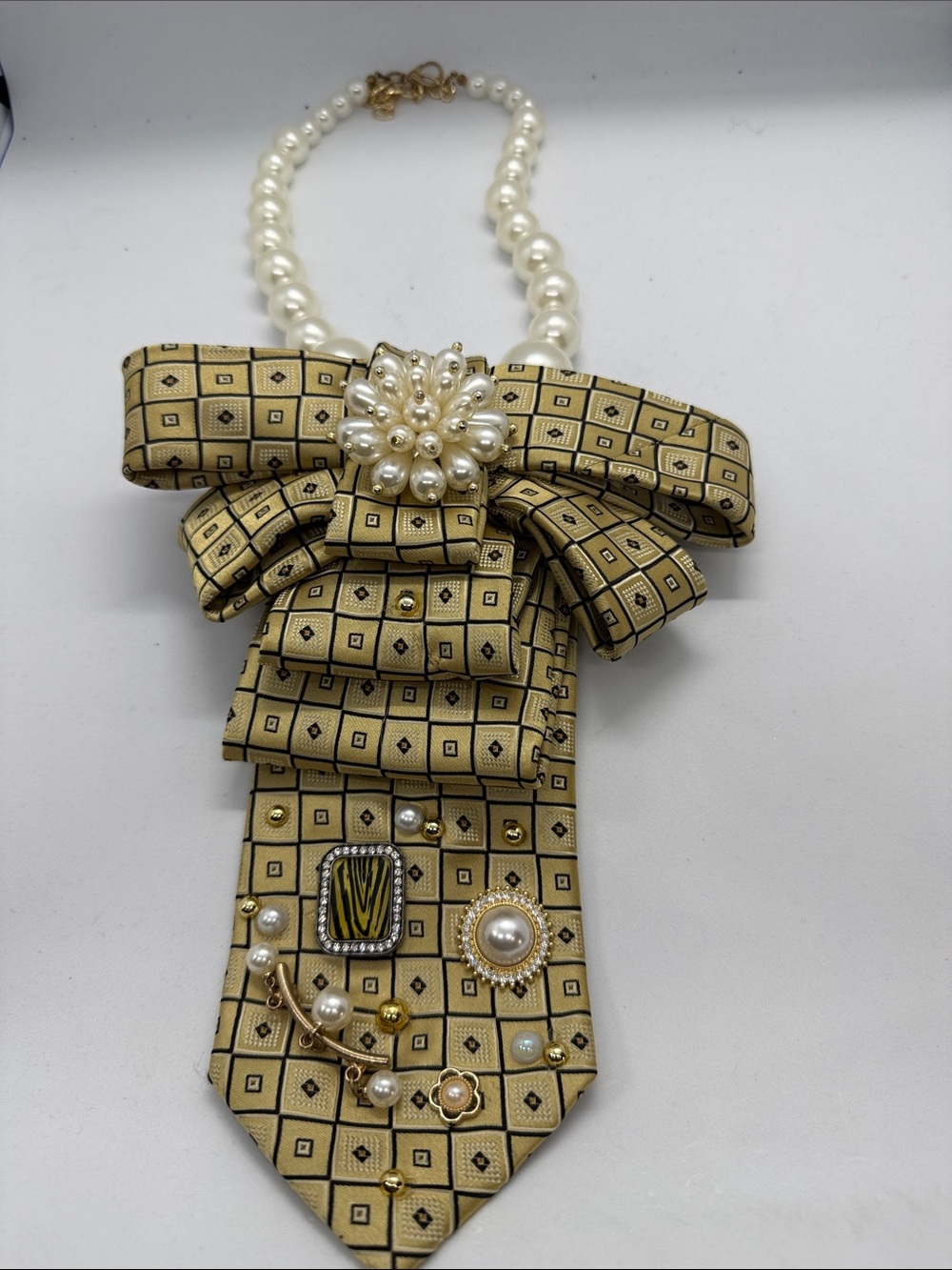Pearl-Accented Gold Patterned Statement Necklace